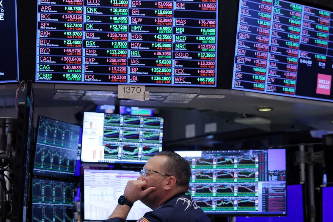 A trader works on the trading floor at the New York Stock Exchange in New York City, US. Picture: REUTERS/ANDREW KELLY